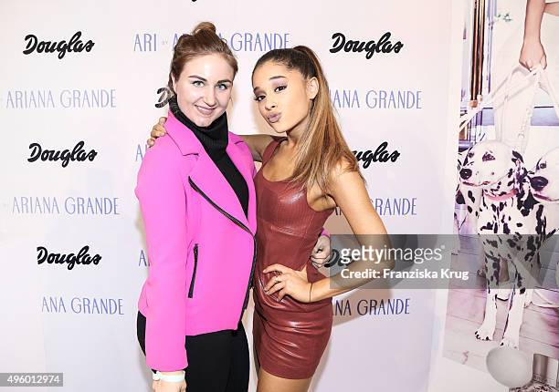 Girlscene Blogger Danique Hoofwijk and Ariana Grande attend the Exclusive Meet & Greet With Ariana Grande At Douglas on November 06, 2015 in Hamburg,...