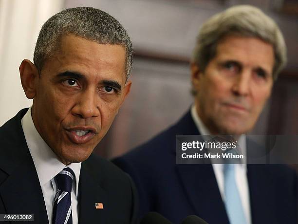 President Barack Obama, flanked by U.S. Secretary of State John Kerry , announces his decision to reject the Keystone XL pipeline proposal, at the...