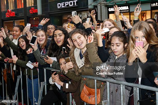 Fans are waiting for Ariana Grande during the Meet & Greet With Ariana Grande to promote her debut fragrance 'Ari by Ariana Grande' on November 06,...