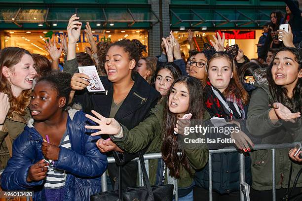 Fans are waiting for Ariana Grande during the Meet & Greet With Ariana Grande to promote her debut fragrance 'Ari by Ariana Grande' on November 06,...