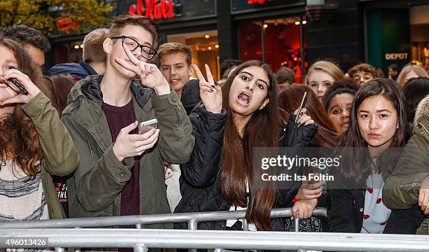 Fans are waiting for Ariana Grande during the Meet & Greet With Ariana Grande to promote her debut fragrance 'Ari by Ariana Grande' on November 06,...