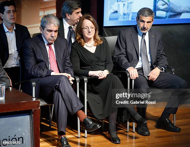 Chief of Cabinet Anibal Fernandez, Social Development Minister Alicia Kirchner and CONICET President Roberto Carlos Salvarezza during the...