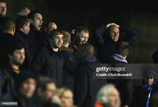 Joint Salford City owners Gary Neville, Paul Scholes and Nicky Butt react to a missed chance during the Emirates FA Cup first round match between...