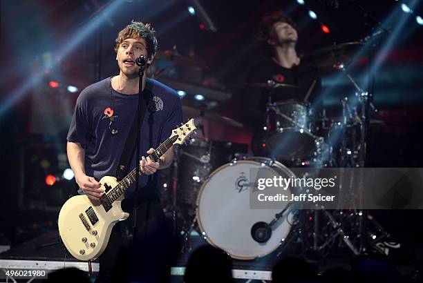 Luke Hemming from 5 Seconds of Summer performs during a live broadcast of "TFI Friday" at the Cochrane Theatre on November 6, 2015 in London, England.