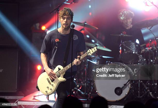 Luke Hemming from 5 Seconds of Summer performs during a live broadcast of "TFI Friday" at the Cochrane Theatre on November 6, 2015 in London, England.