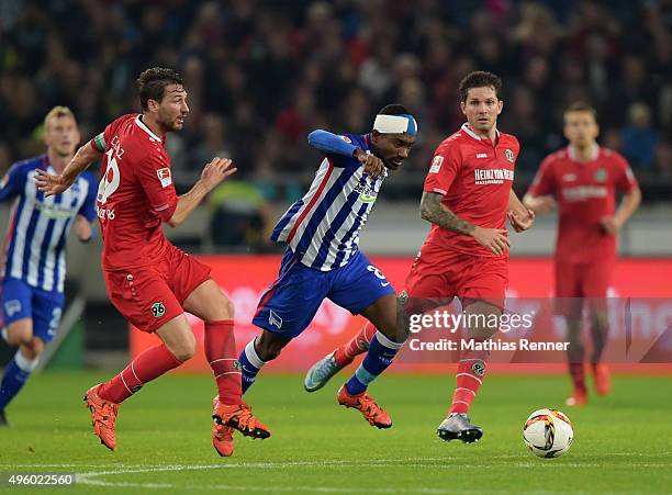 Christian Schulz of Hannover 96 and Salomon Kalou of Hertha BSC during the Bundesliga match between Hannover 96 and Hertha BSC at HDI-Arena on...