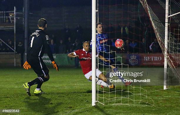 Danny Webber of Salford City scores their first goal past goalkeeper Roy Carroll of Notts County during the Emirates FA Cup first round match between...