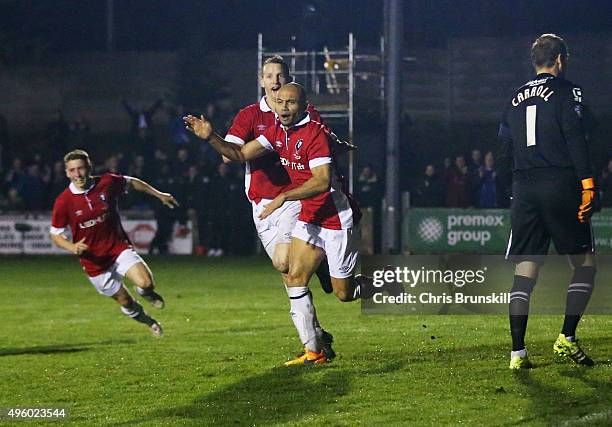 Danny Webber of Salford City celebrates as he scores their first goal as goalkeeper Roy Carroll of Notts County looks dejected during the Emirates FA...