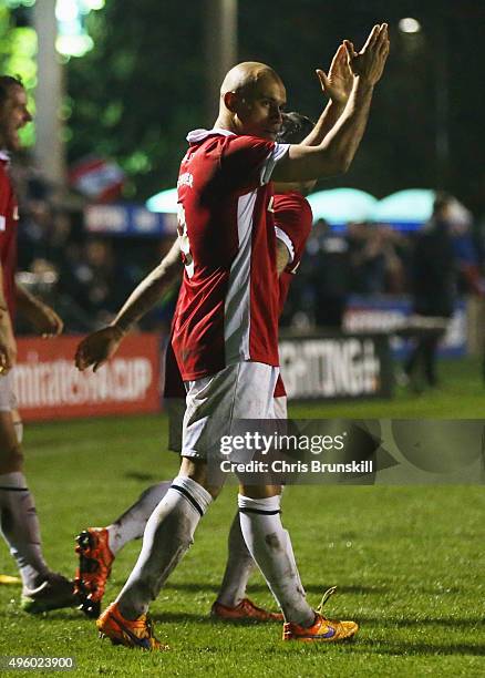 Danny Webber of Salford City applauds the crowd as he scores their first goal during the Emirates FA Cup first round match between Salford City and...