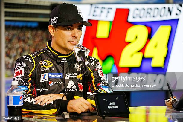 Retiring driver Jeff Gordon attends a press conference with Texas Motor Speedway President Eddie Gossage at Texas Motor Speedway on November 6, 2015...