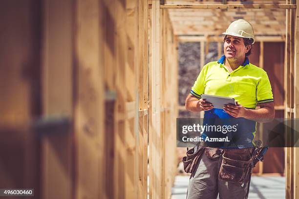 checking construction site - builder stock pictures, royalty-free photos & images