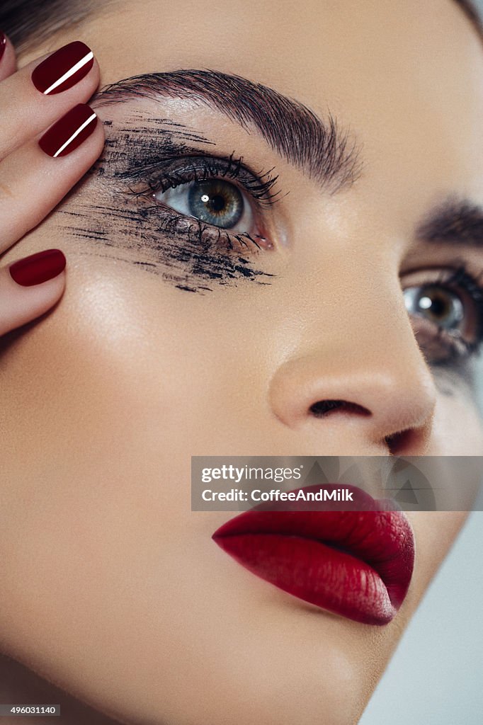 Studio shot of young beautiful woman