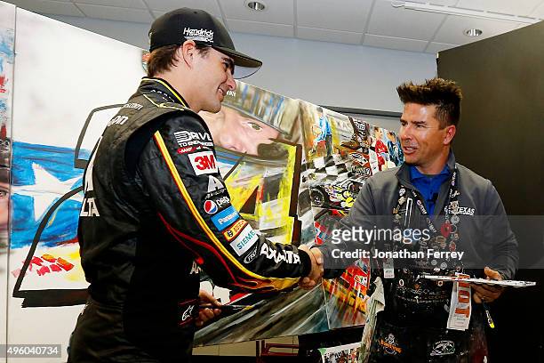 Retiring driver Jeff Gordon attends a press conference with sports artist David Arrigo at Texas Motor Speedway on November 6, 2015 in Fort Worth,...