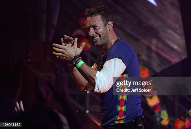 Chris Martin from Coldplay performs during a live broadcast of "TFI Friday" at the Cochrane Theatre on November 6, 2015 in London, England.