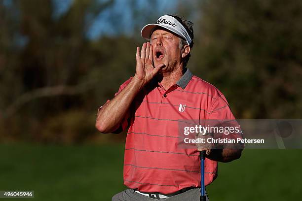 Michael Allen "howls" to the fans in reaction to his birdie putt on the 17th green during the second round of the Charles Schwab Cup Championship on...