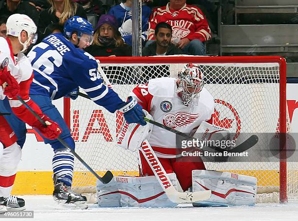 Petr Mrazek of the Detroit Red Wings makes the second period save on Byron Froese of the Toronto Maple Leafs at the Air Canada Centre on November 6,...