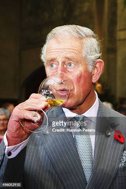 Prince Charles, Prince of Wales tastes wine at Mahana Winery on November 7, 2015 in Nelson, New Zealand. The Royal couple are on a 12 day tour...