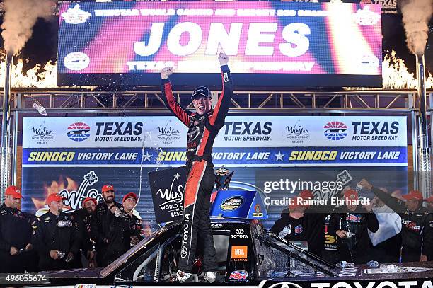 Erik Jones, driver of the Toyota Toyota, celebrates in victory lane after winning the NASCAR Camping World Truck Series WinStar World Casino 350 at...