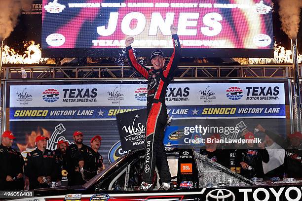 Erik Jones, driver of the Toyota Toyota, celebrates in victory lane after winning the NASCAR Camping World Truck Series WinStar World Casino 350 at...