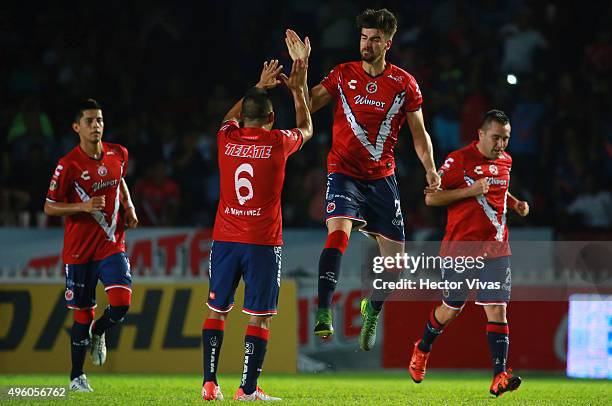 Rodrigo Noya of Veracruz celebrates with teammates after scoring the first goal of his team during the 16th round match between Veracruz and Tigres...