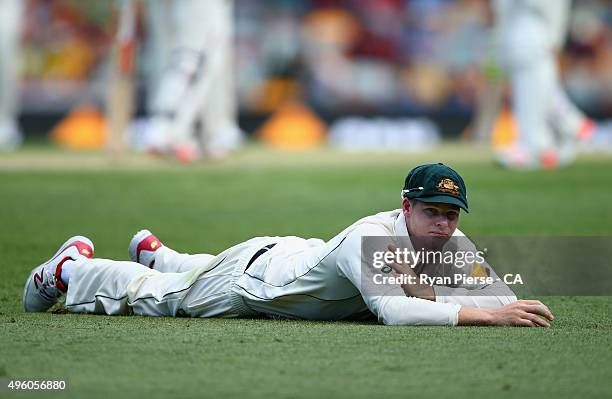 Steve Smith of Australia looks on after fielding the ball during day three of the First Test match between Australia and New Zealand at The Gabba on...