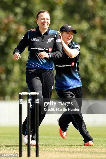 Lea Tahuhu and Katie Perkins both of New Zealand celebrate the wicket of Shashikala Siriwardene of Sri Lanka during the Third Women's One Day...