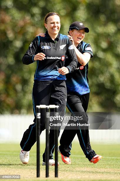 Lea Tahuhu and Katie Perkins both of New Zealand celebrate the wicket of Shashikala Siriwardene of Sri Lanka during the Third Women's One Day...