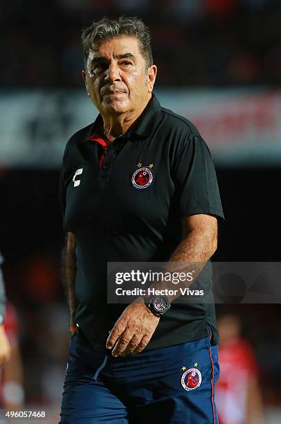 Carlos Reinoso coach of Veracruz walks on the sideline during the 16th round match between Veracruz and Tigres UANL as part of the Apertura 2015 Liga...