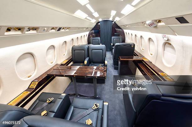 business jet interior - jet privé stockfoto's en -beelden