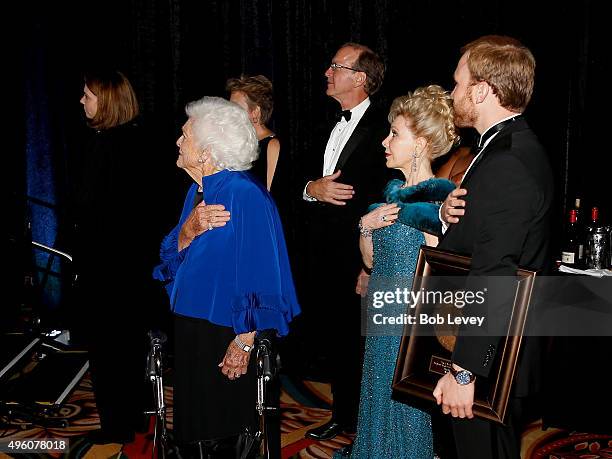 Honoree Barbara Bush, Neil Bush, presenter Margaret Alkek Williams and Pierce Bush at the UNICEF Audrey Hepburn Society Ball honoring former first...