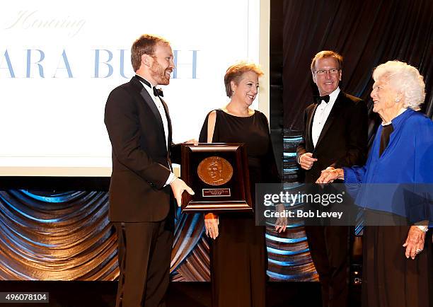 Pierce Bush, President & CEO U.S. Fund for UNICEF Caryl Stern, Neil Bush and honoree Barbara Bush onstage at the UNICEF Audrey Hepburn Society Ball...