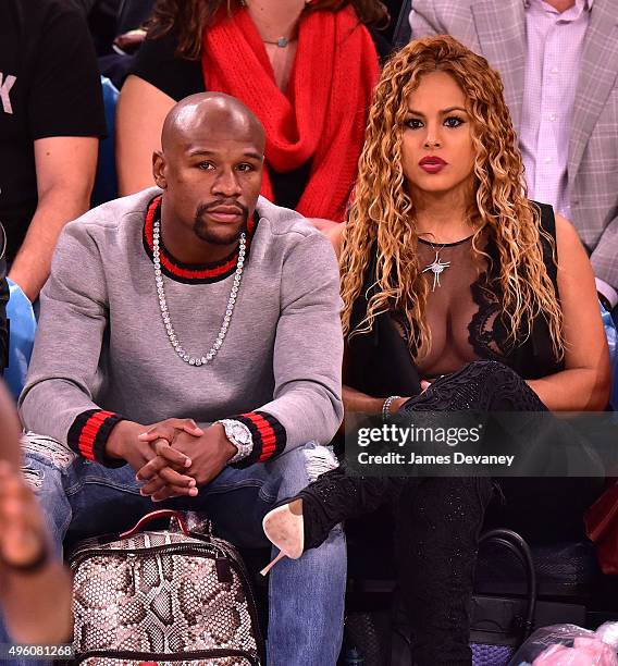 Floyd Mayweather Jr. And Liza Hernandez attend New York Knicks vs Milwaukee Bucks game at Madison Square Garden on November 6, 2015 in New York City.