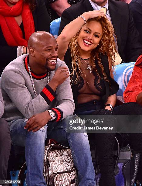 Floyd Mayweather Jr. And Liza Hernandez attend New York Knicks vs Milwaukee Bucks game at Madison Square Garden on November 6, 2015 in New York City.