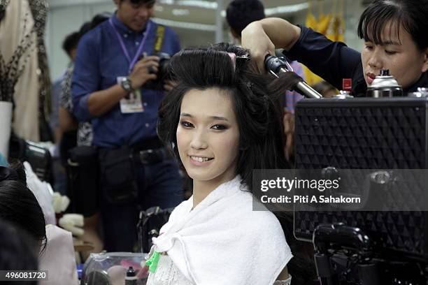 Contestant Sutsuki from Japan prepares backstage before the final show of the Miss International Queen 2015 transgender/transsexual beauty pageant in...