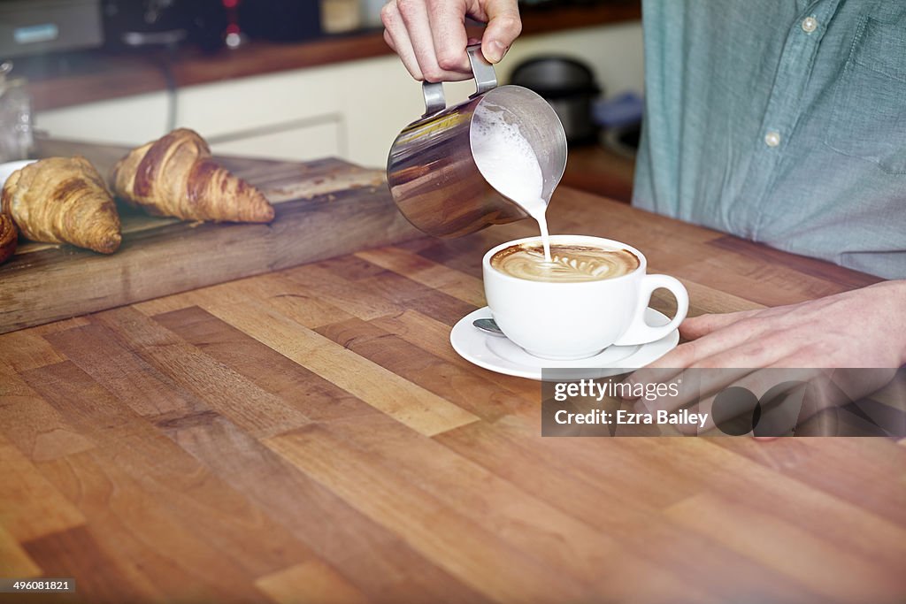 Man making a perfect coffee.