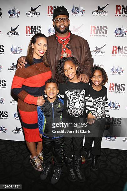 Yankees Pitcher C.C. Sabathia and wife Amber Sabathia pose with their kids Jayden, Cyia and Carter at their PitCCh In Foundation's 5th Annual CC...