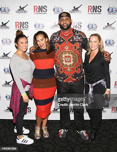 Yankees Pitcher C.C. Sabathia and wife Amber Sabathia pose with Rachel Ortiz and Michelle Serafin-Seelinger at their PitCCh In Foundation's 5th...