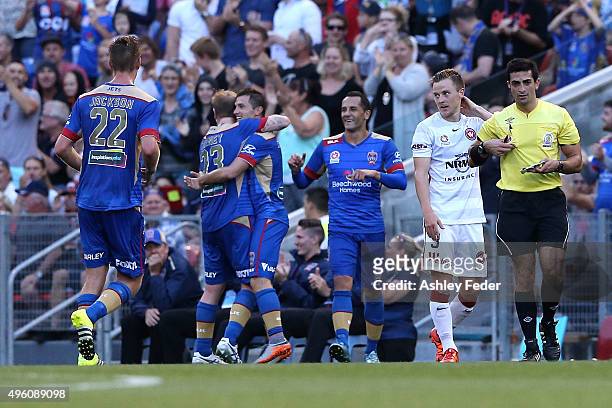 Jets players celebrate a goal during the round five A-League match between the Newcastle Jets and the Western Sydney Wanderers at Hunter Stadium on...