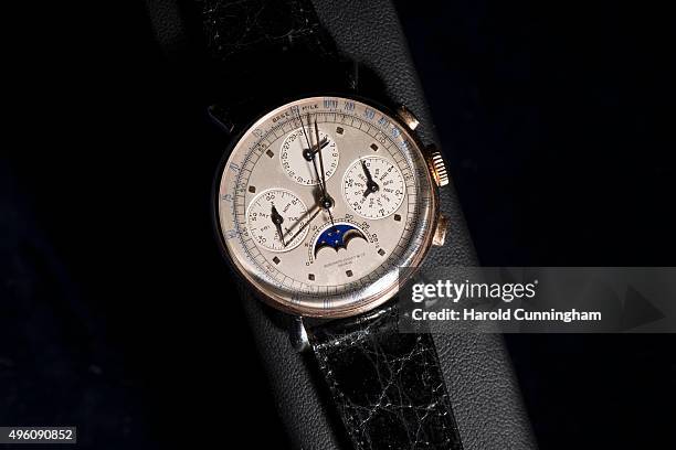 Rare Audemars Piguet stainless steel and 14k pink gold full calendar chronograph wristwatch wit moon phases and two-tone silvered dial expected to...