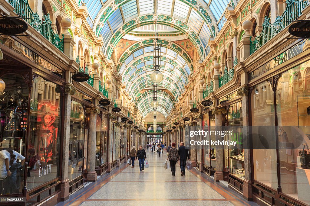 Shoppers walking through County Arcade in Leeds, West Yorkshire