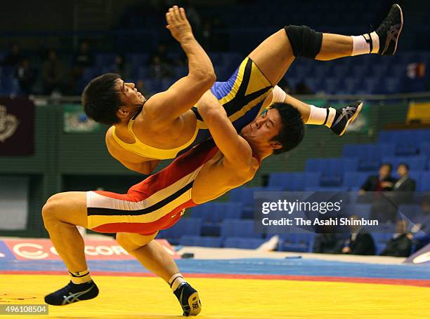 Shingo Matsumoto throws Mitsuhiro Ota in the Men's Greco-Roman -84kg final during day one of the Emperor's Cup All Japan Wrestling Championships at...