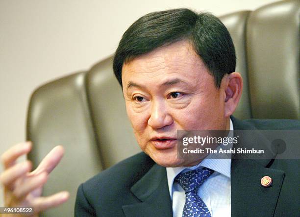 Former Thai Prime Minister Thaksin Shinawatra speaks during the Asahi Shimbun interview at a hotel on January 22, 2007 in Tokyo, Japan.