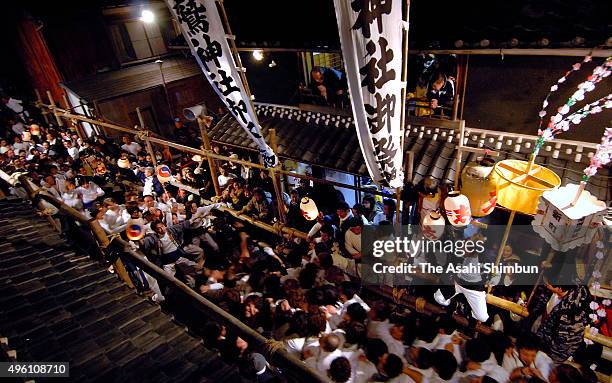 Men in white clothes mob during the Owase Yaya Festival on February 3, 2007 in Owase, Mie, Japan.