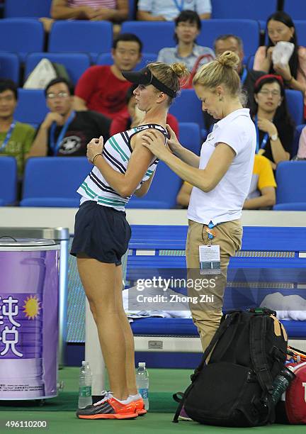 Elina Svitolina of Ukraine receives medical treatment during the match against Karolina Pliskova of Czech Republic on day 6 of Huajin Securities WTA...