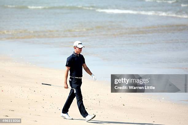 Brandon Stone of South Africa walks to play his second shot on the 12th hole from the beach during the final round of the NBO Golf Classic Grand...