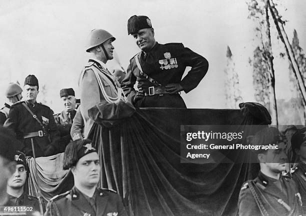 Italian fascist dictator Benito Mussolini at a march past of athletes in the Via Del Circo Massimo, Rome, 28th October 1934.