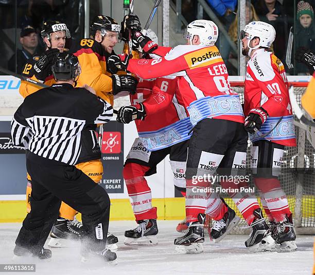 Brooks Macek, David Wolf of Team Germany, Timo Helbling and Larry Leeger and Etienne Froidevaux of Team Swiss during the game between Germany and the...