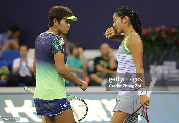 Chen Liang of China and Yafan Wang of China react during the match against Klaudia Jans-Ignacik of Poland and Andreja Klepac of Slovakia on day 6 of...