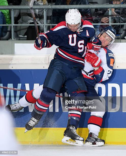 Jim Slater of Team USA and Vladimir Dravecky of Team Slovakia during the game between USA and the Slovakia on November 6, 2015 in Augsburg, Germany.