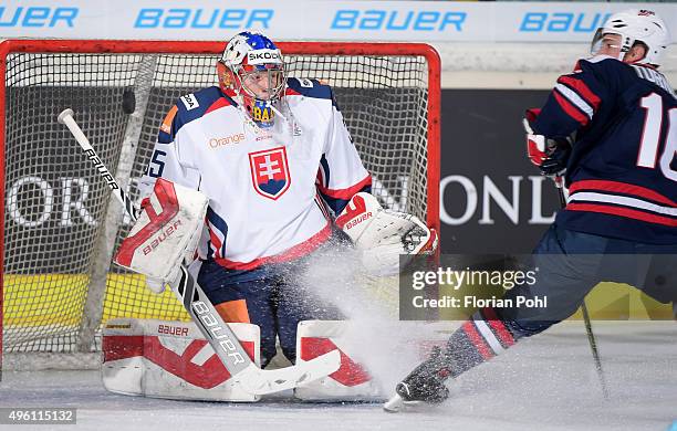 Samuel Baros of Team Slovakia and Travis Turnbull of Team USA during the game between USA and the Slovakia on November 6, 2015 in Augsburg, Germany.